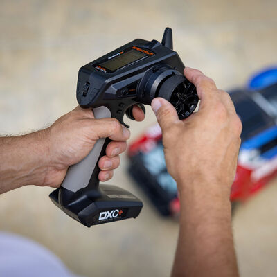 DXC+ 12-Channel DSMR+ Transmitter with SR615 Receiver DXC+ 12-Channel DSMR+ Transmitter with SR615 Receiver